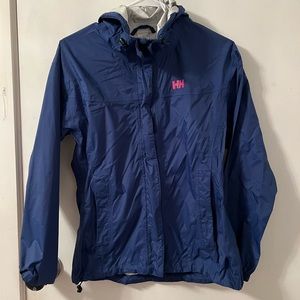 Small Helly Hansen rain coat. Navy blue with pink logo! Like new !!!!